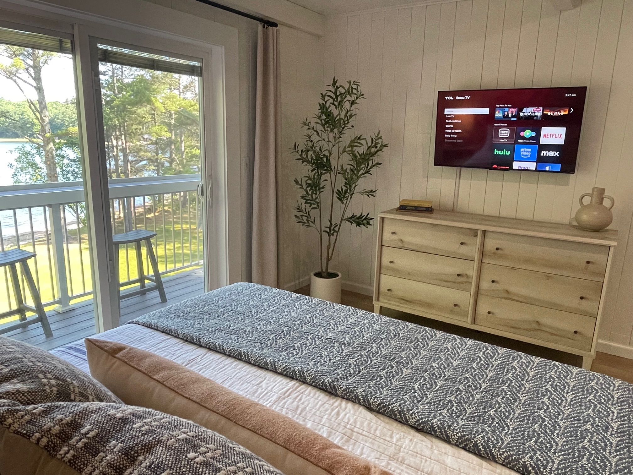 Enjoy lake views and your favorite show - all from the comfort of bed