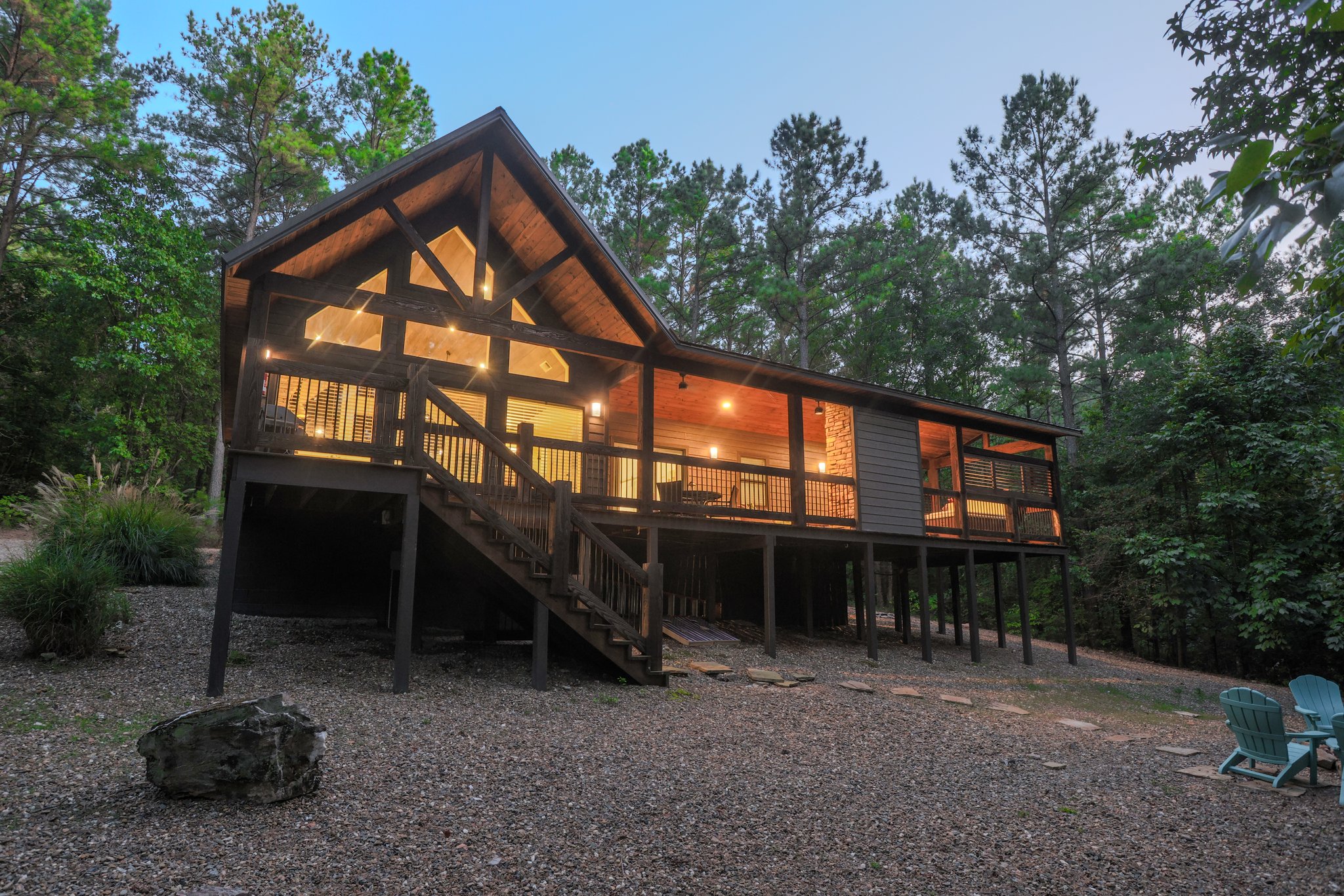Exterior Retreat: Embrace nature with stunning views and inviting outdoor space in Broken Bow!