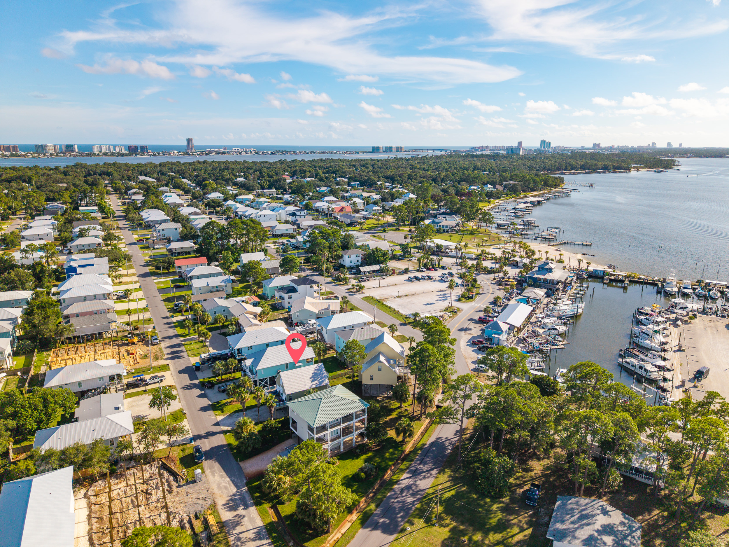 The wider Bear Point community offers scenic waterways and a relaxed, residential feel just minutes from the beach.