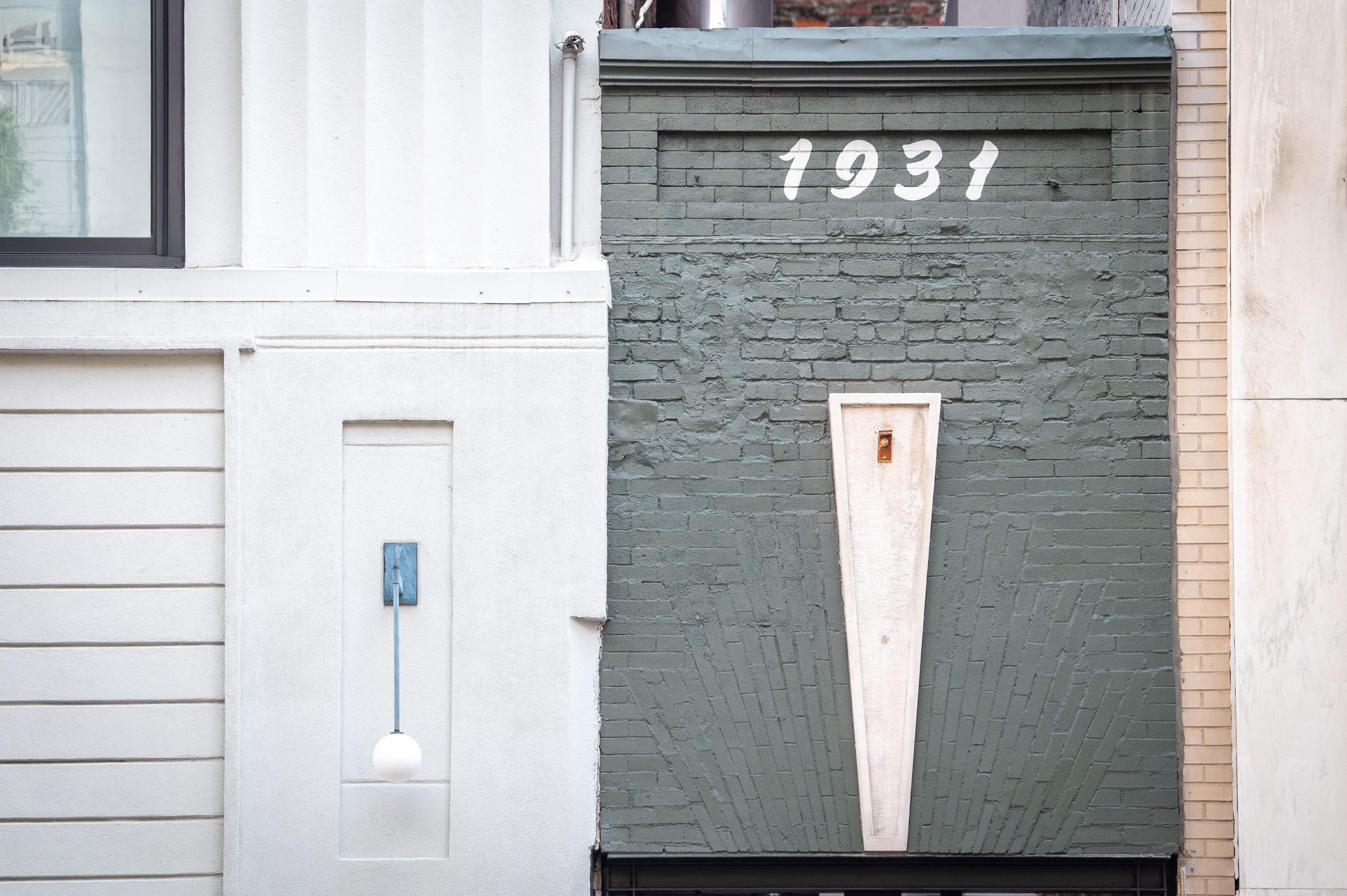 A secure gateway—guests enter through this sleek, black metal door, which leads to the private and contemporary comforts of your stay at 1931 2nd Avenue N