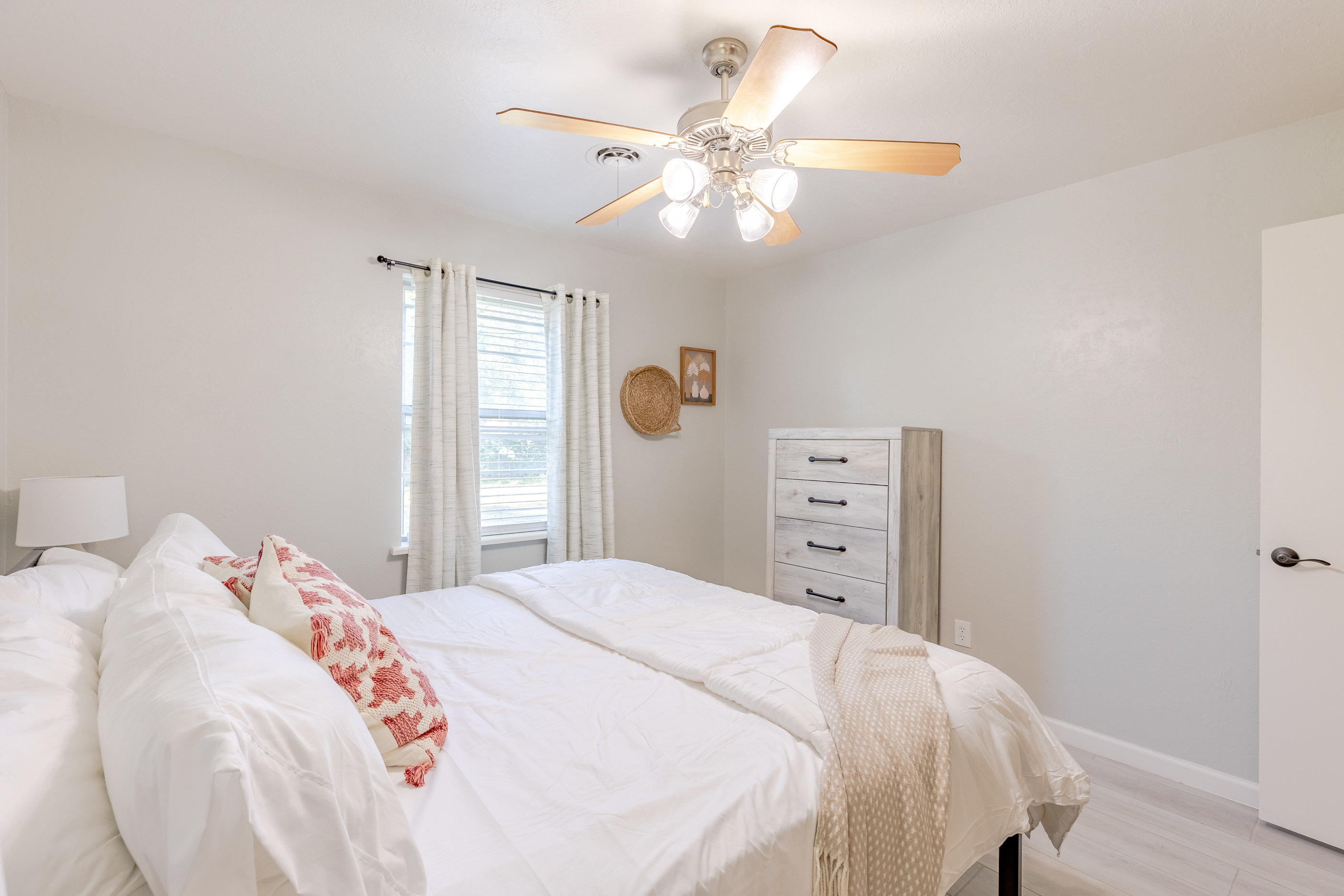 Your getaway starts here: master suite featuring a cozy king bed.