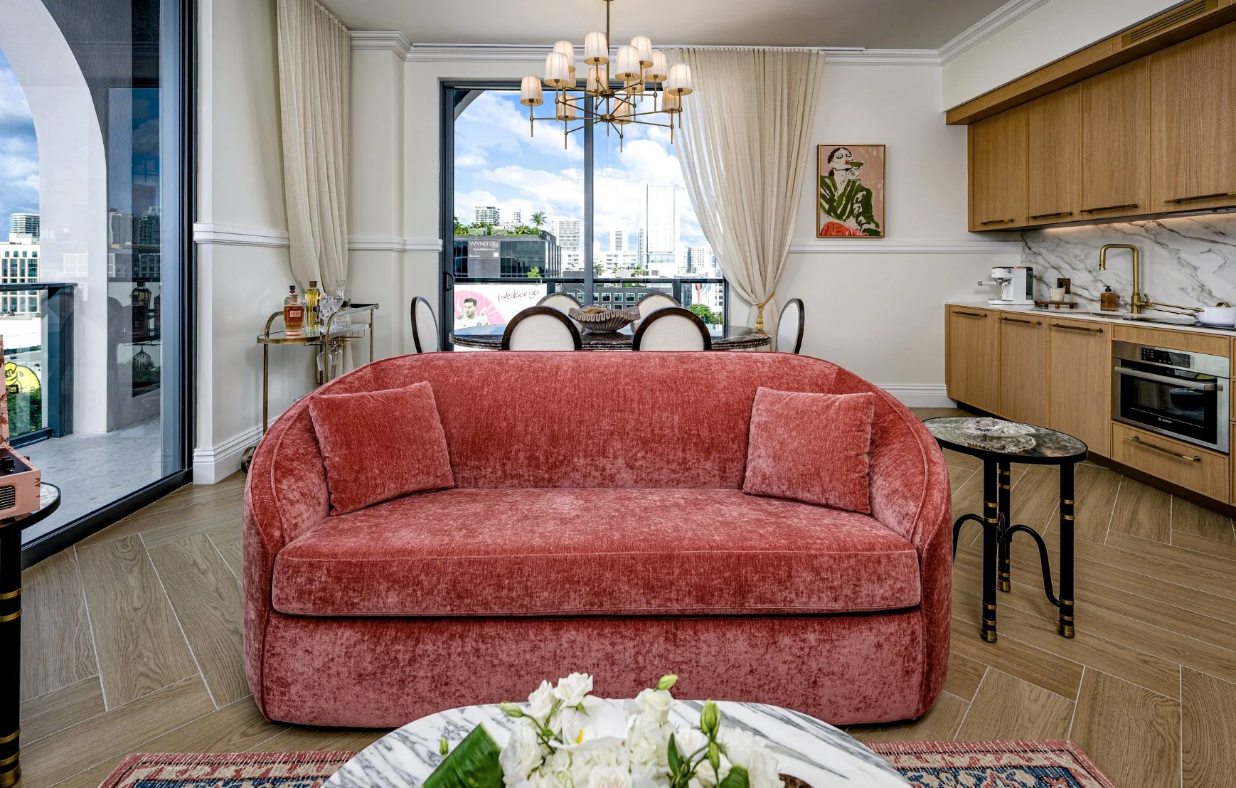 Lounge nook + kitchenette — perfect spot for morning coffee with city outlook