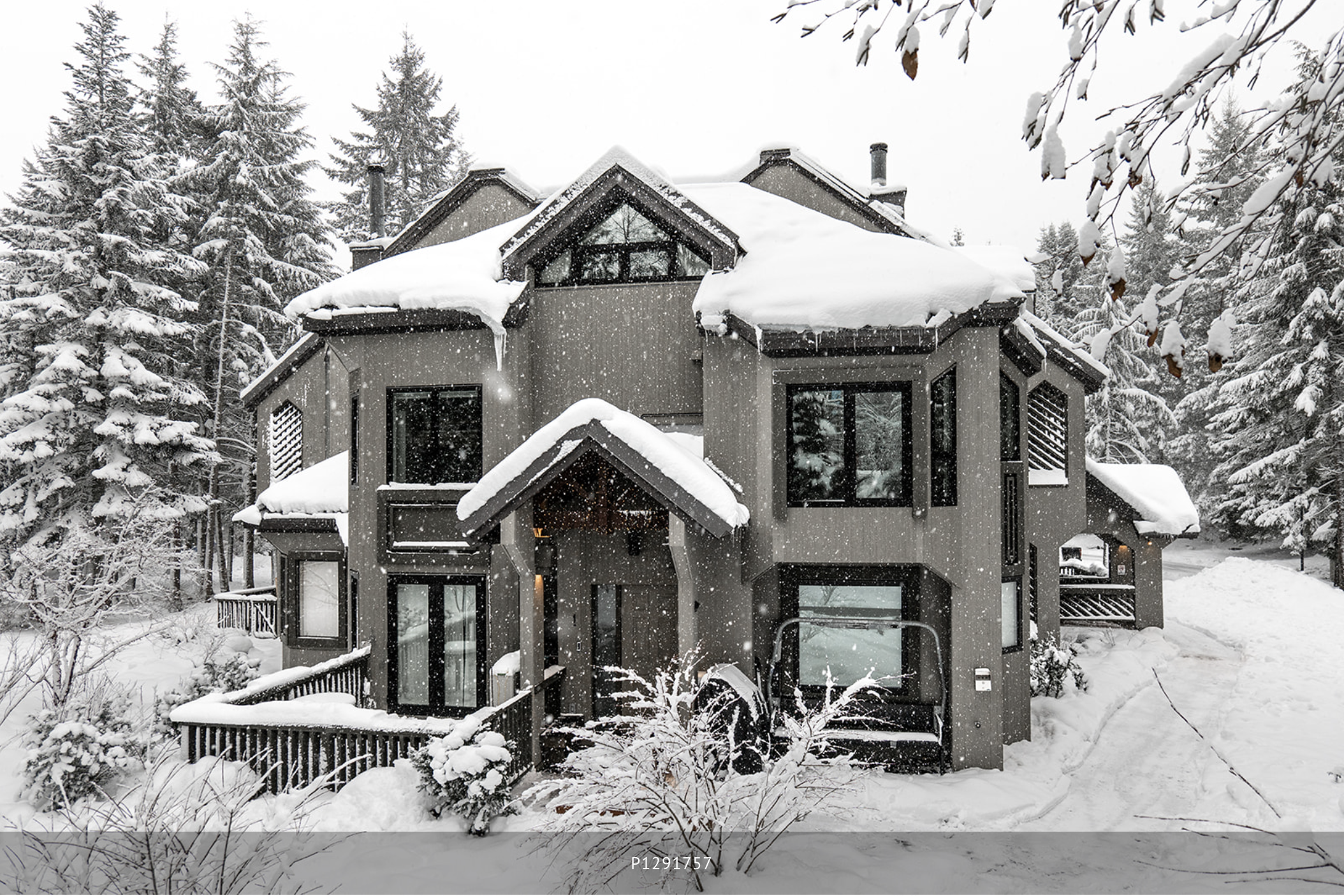 End-unit townhome exterior in winter snow