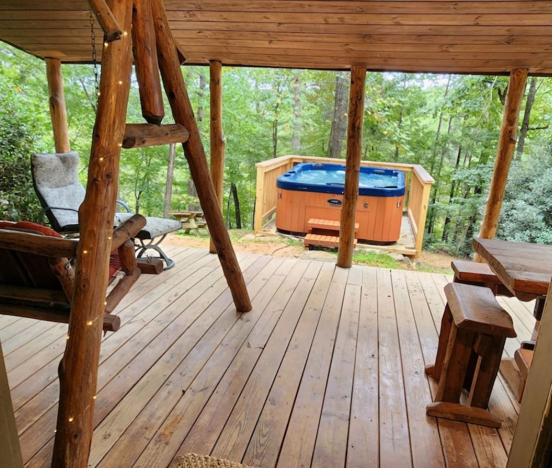 Lower level deck with Lake/ Beach views and hot tub.