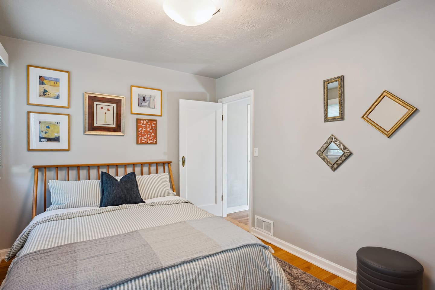 Upstairs bedroom outfitted with queen size bed