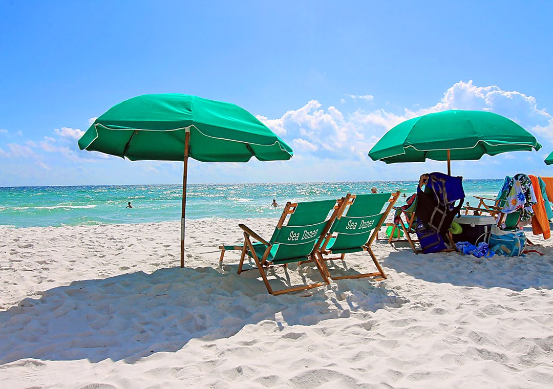 Complimentary Beach umbrella and chairs