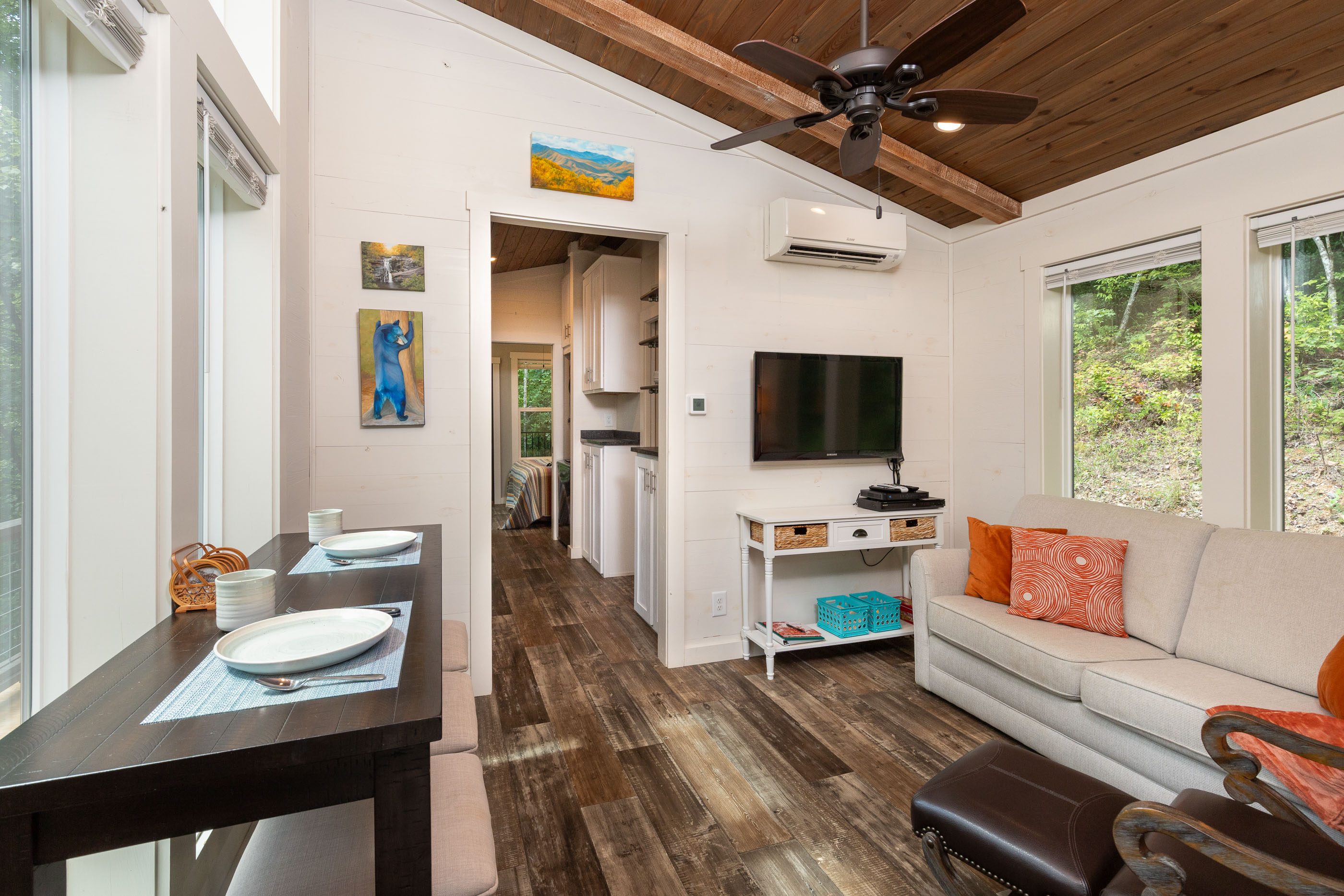 Bright and welcoming—relax on the sofa sleeper or sink into a comfy chair with mountain views all around.