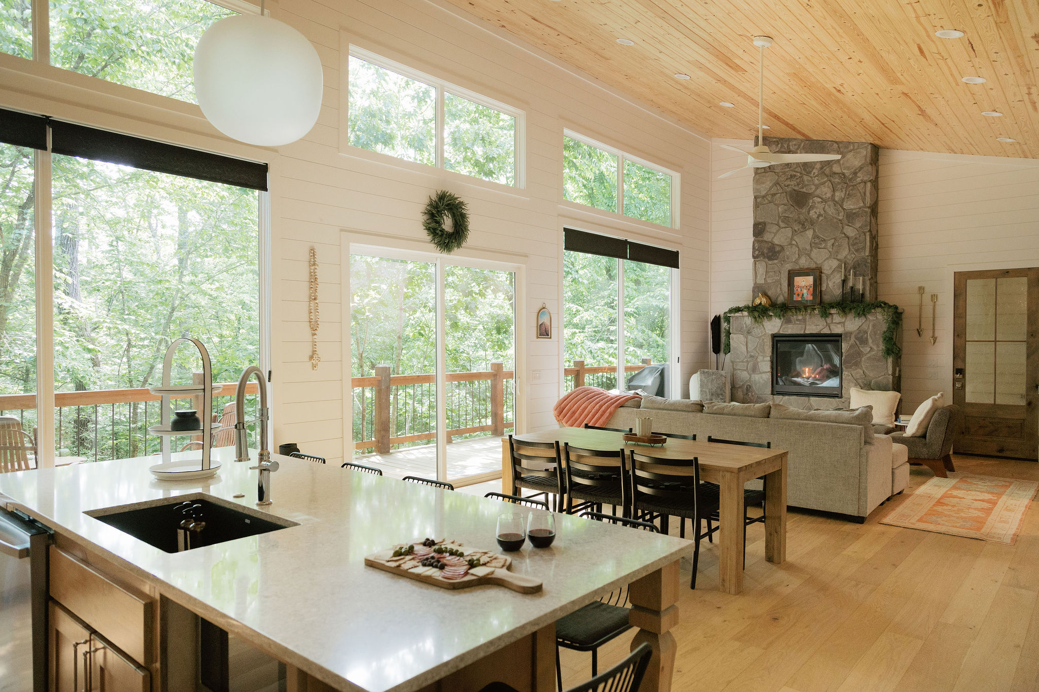 Cozy living space with view of the woods