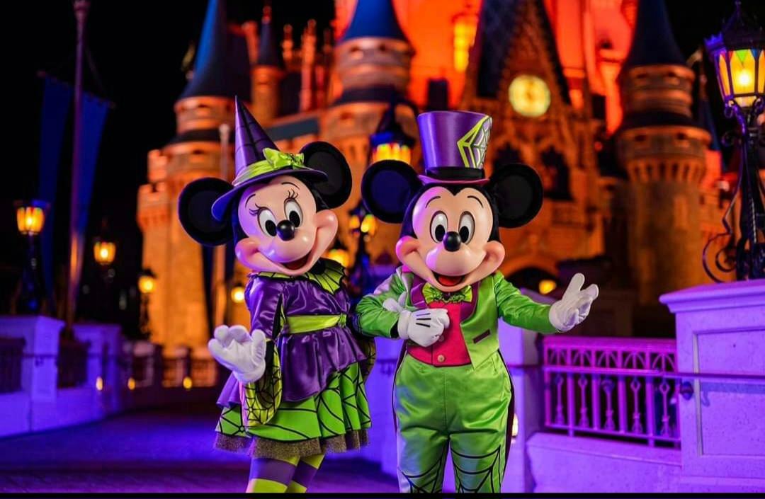 Mickey & Minnie are ready for spooky season! 🎃✨ it's the perfect time for a fall Disney trip!