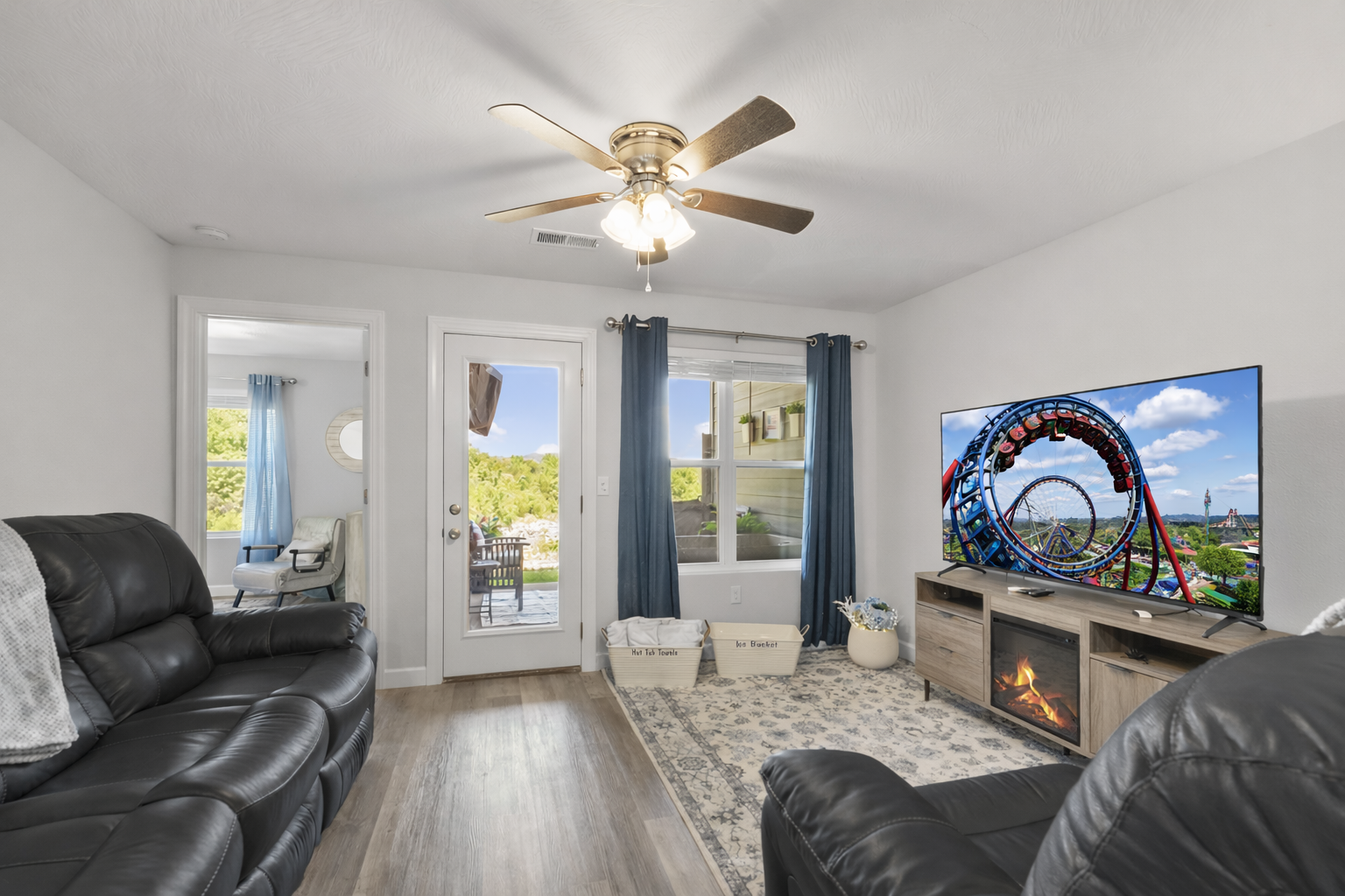 Leave the cares behind as you unwind in this cozy, bright living room. Spacious with breathtaking views of the mountains. Step outside onto your private patio and enjoy your personal hot tub to end the perfect day.