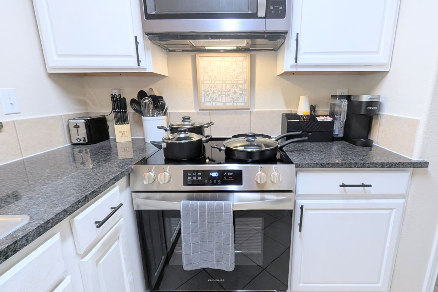 Cooking is a breeze with a complete set of cookware, utensils, and knives. 