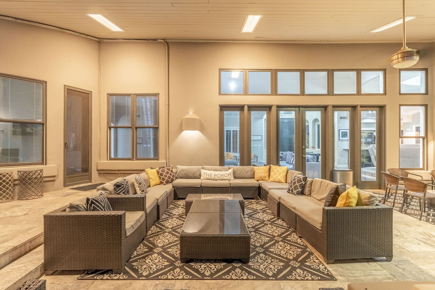 This inviting seating area offers the ideal mix of comfort and charm for memorable outdoor evenings.