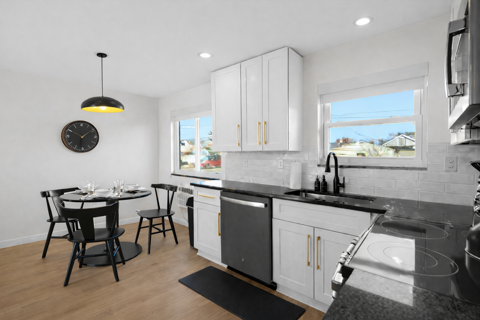 Bright, open kitchen and dining space with modern finishes, ample counter space, and natural light—perfect for cooking, dining, and everyday living.