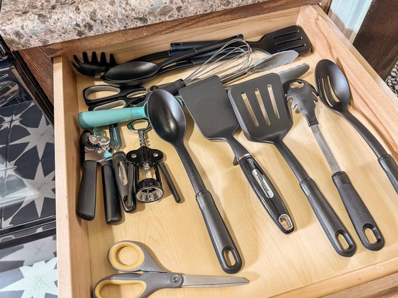Complete kitchen toolkit including scissors, whisk, and other essentials for all your cooking needs.