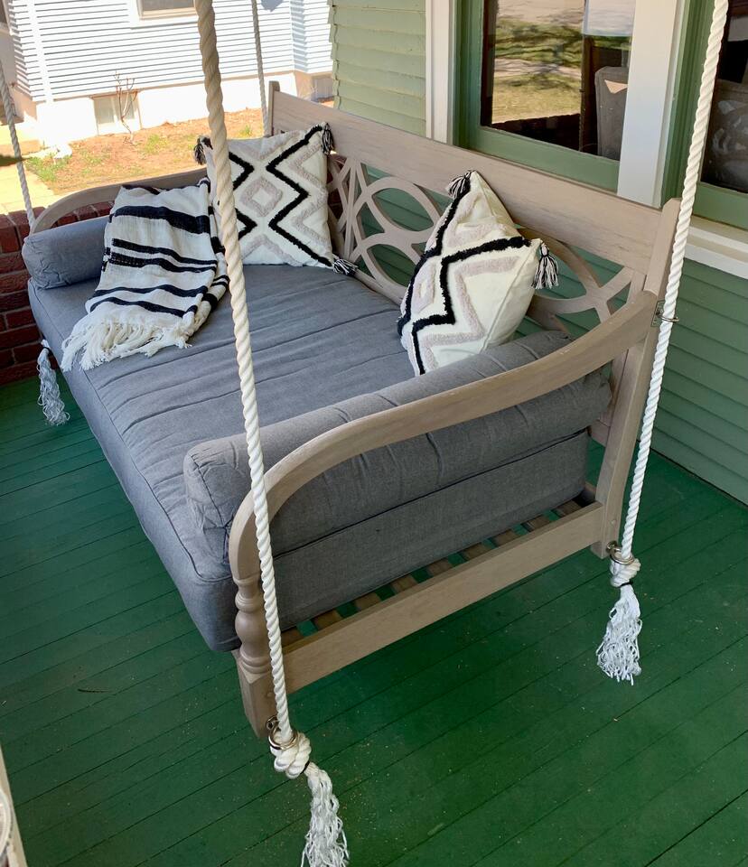 Imagine watching golfers from the view of your porch swing!