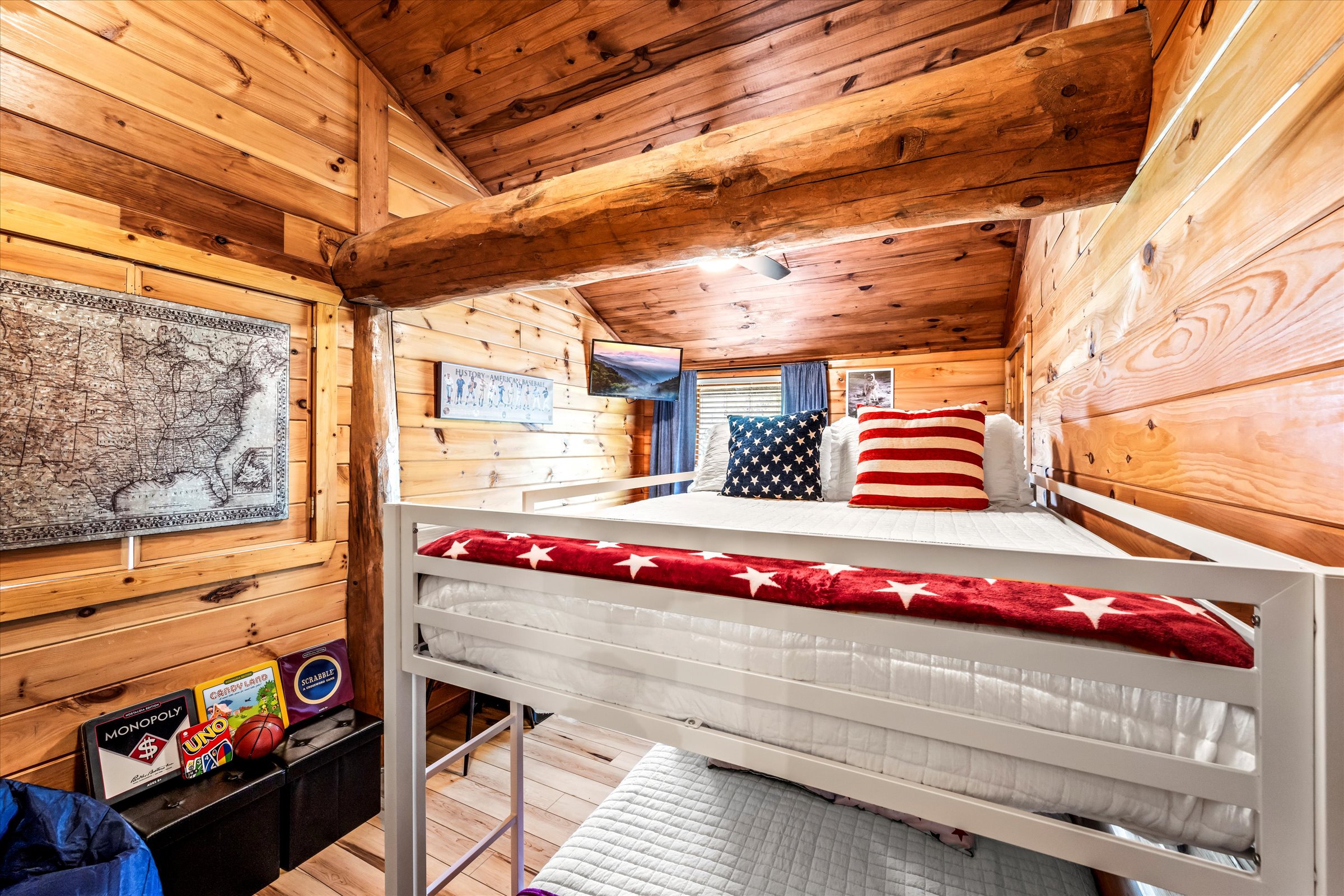 The kids room has a full-over-full bunk bed (fits 4 kids or 2 teens/adults). It also has 2 arcade machines, a mini basketball hoop, board games, and Jenga!