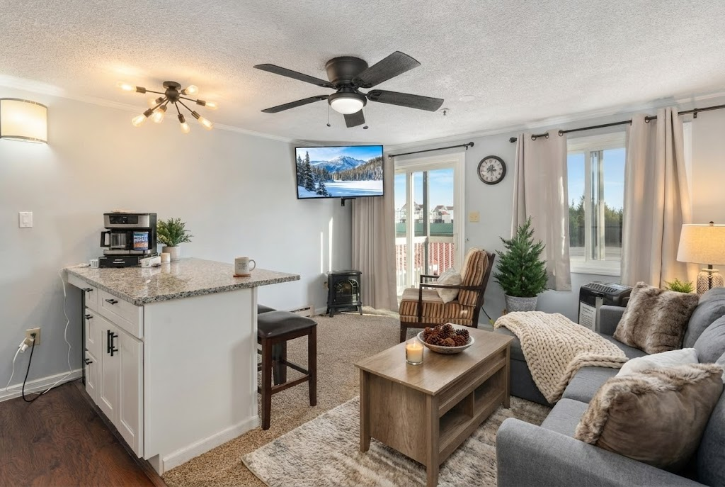 The living room brings a light and comfortable vibe for relaxation!  Guest Review Highlight Sarah Hastings: "Mountain Lodge 219 was exactly what we were looking for! The location was perfect,