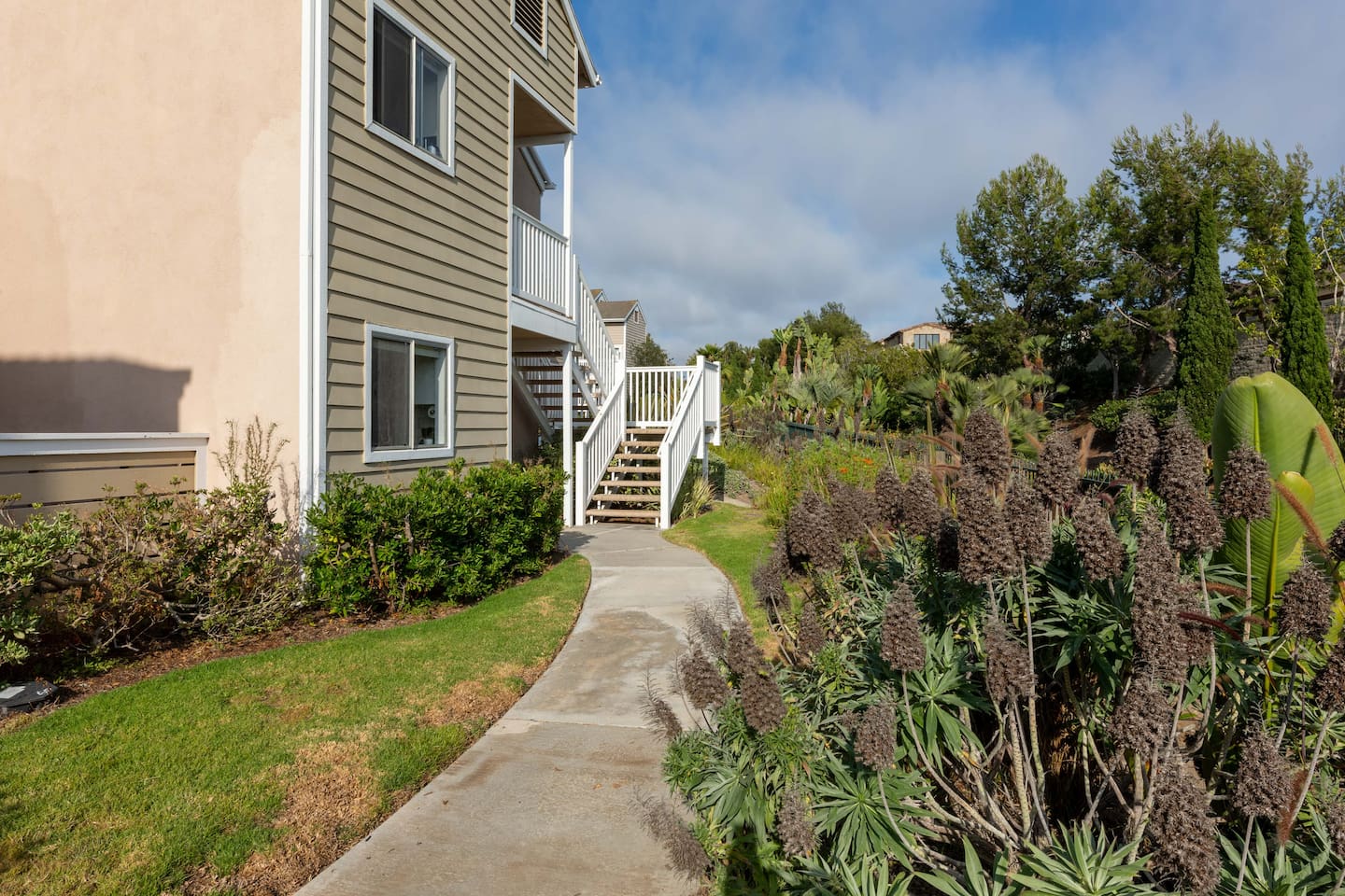 Lots of landscaping and greenery 