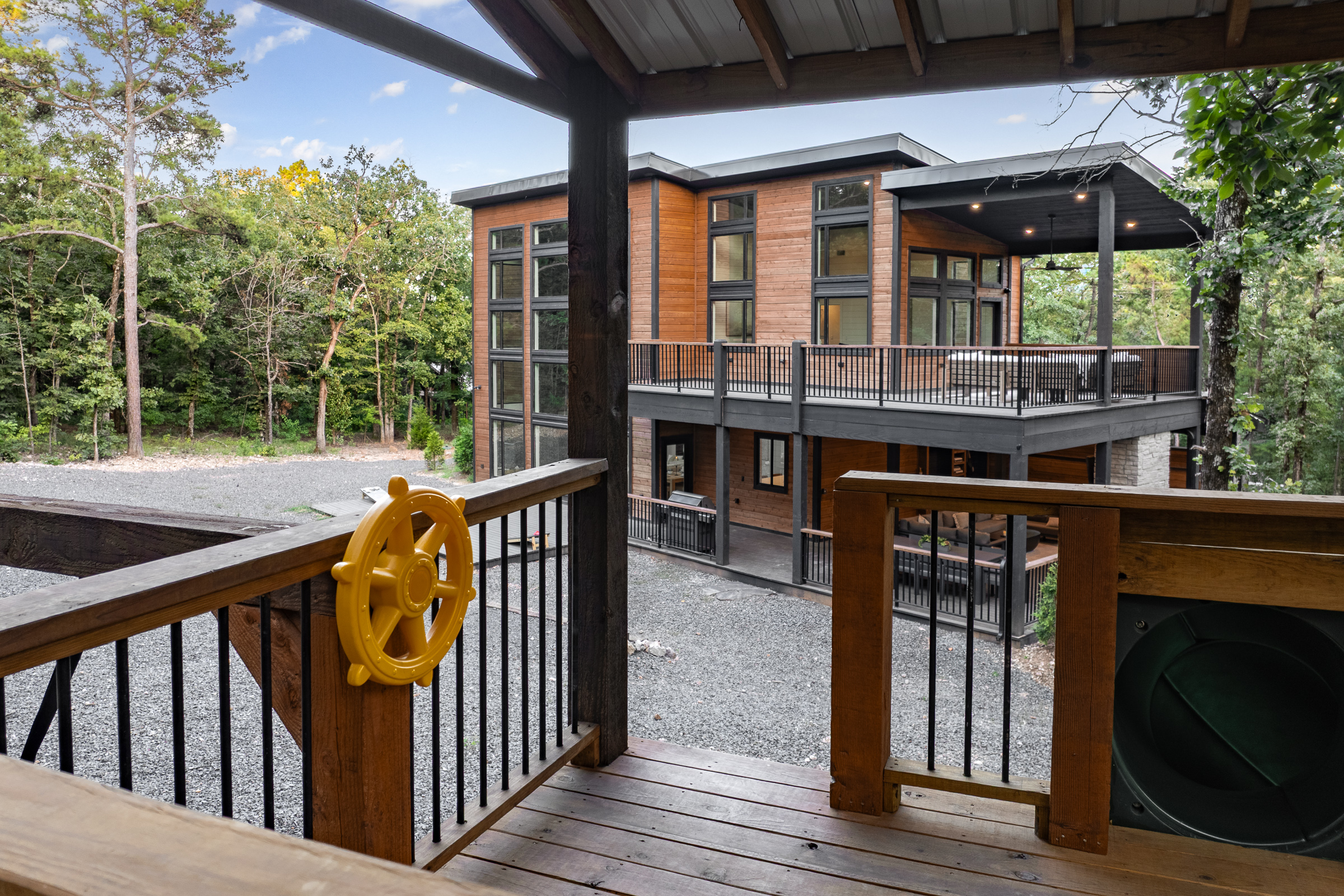 Kids love it in their large, personal tree house. Complete with slide, swings, and climbing wall