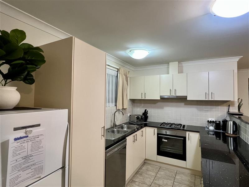 Lovely modern kitchen with coffee pod machine