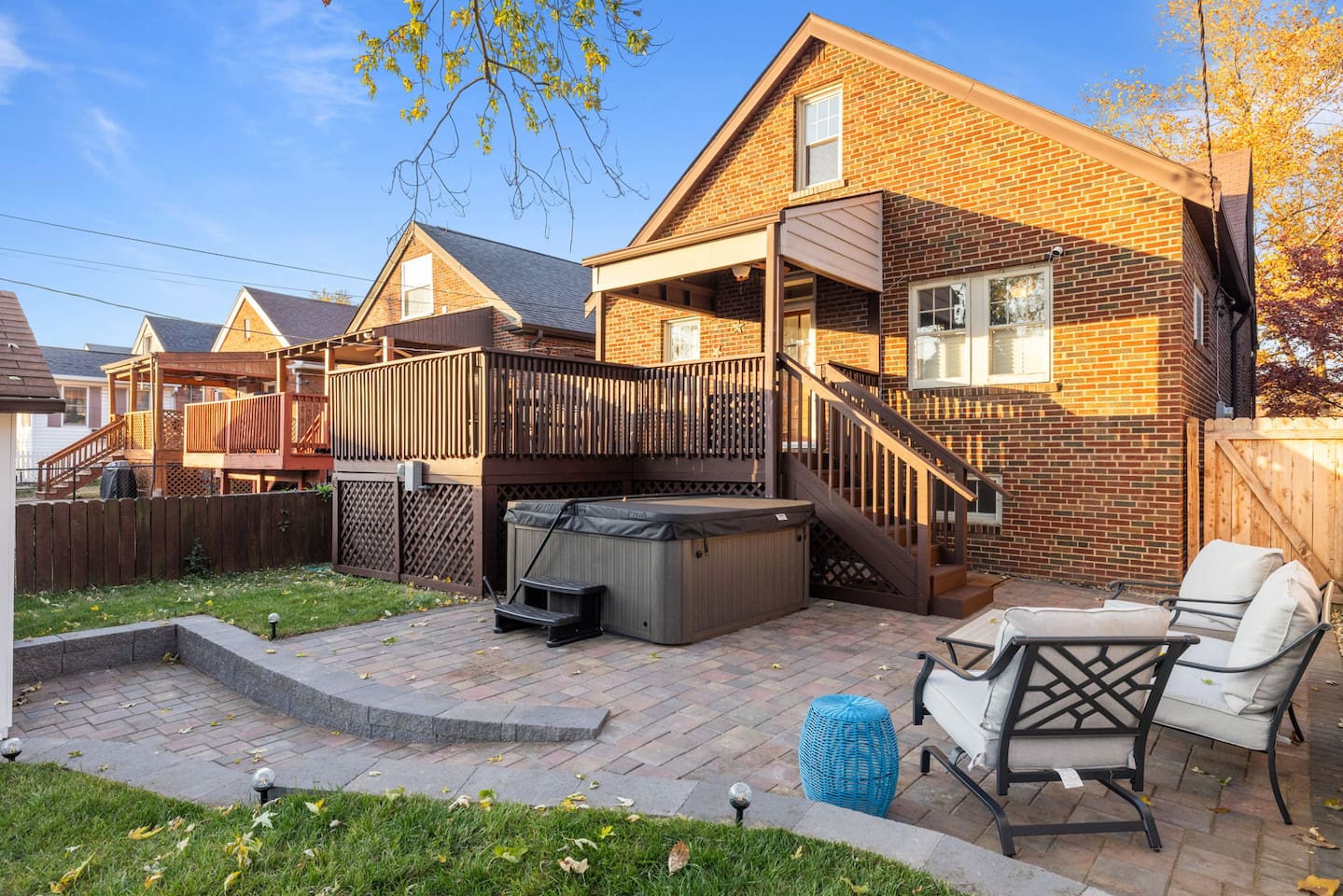 Fenced in back yard includes patio area with Jacuzzi and comfy outdoor seating. Two extra folding chairs available.  Separate towels provided for hot tub use.