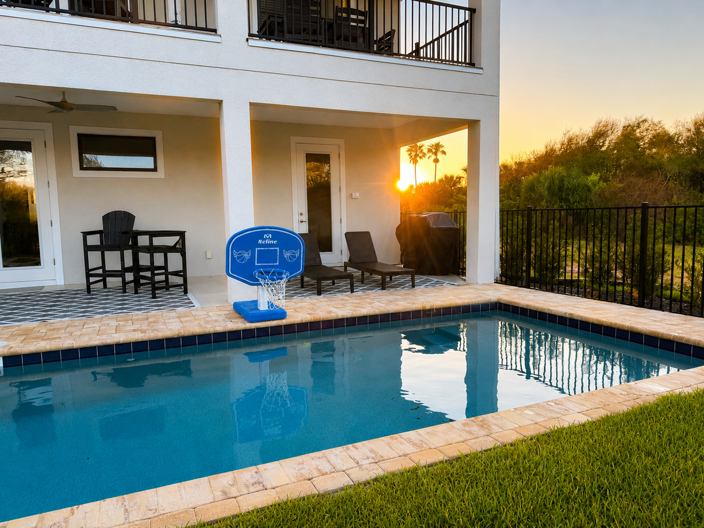Fire up the grill, shoot a few hoops, and let the kids splash as the sun sinks behind the palms. This private pool and patio is your family's own little world—no schedules, no crowds, just golden evenings and the easy joy of being together.