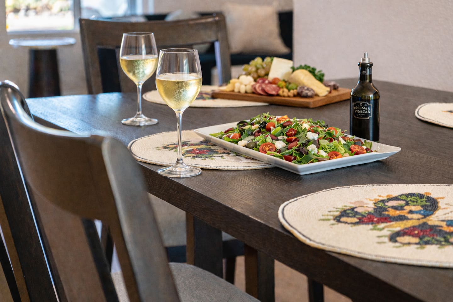 Enjoy meals together in a beautifully styled dining space—perfect for wine nights, charcuterie, and memorable gatherings