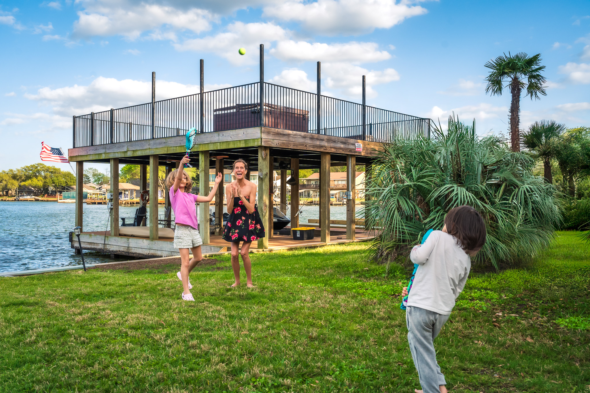 Laughter, sunshine, and backyard games by the lake—because the best vacations are the ones spent playing together.