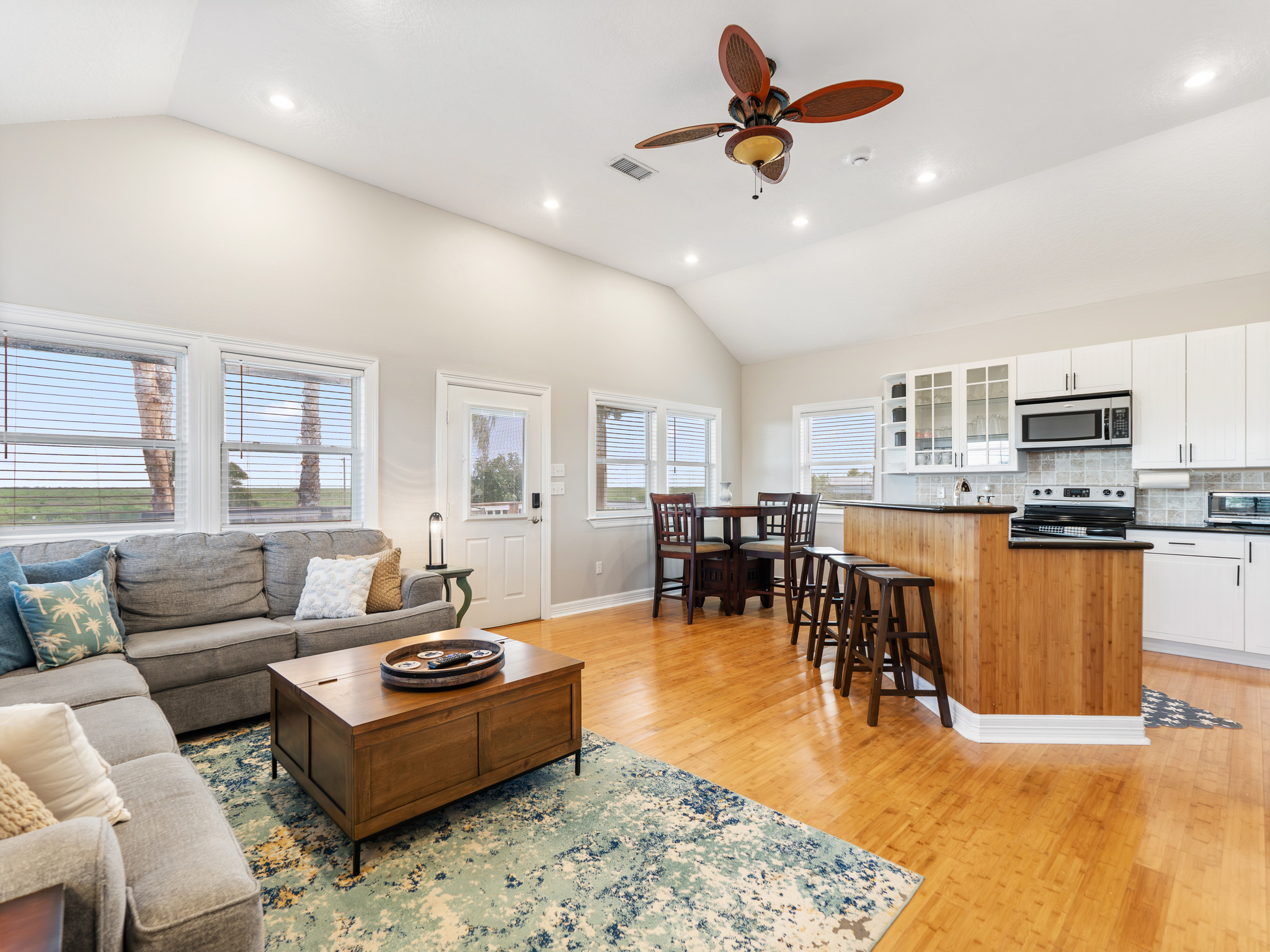 View of open concept living, kitchen and dining room.