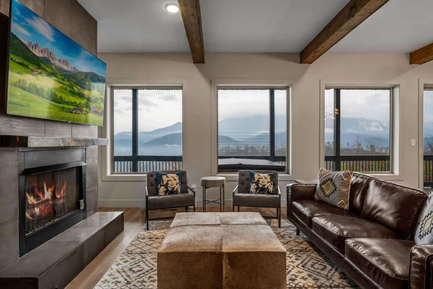 Gatlinburg Airbnb with second-level living room and game room featuring pool table, cozy seating, and mountain views. Minutes from downtown Gatlinburg, Pigeon Forge & Smoky Mountains National Park. 