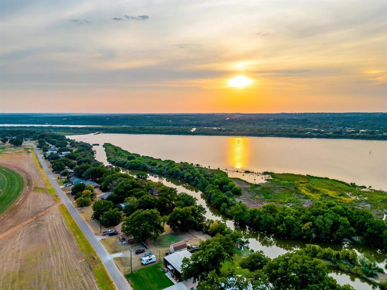 Aerial sunset view of The Noir on Lake Granbury
