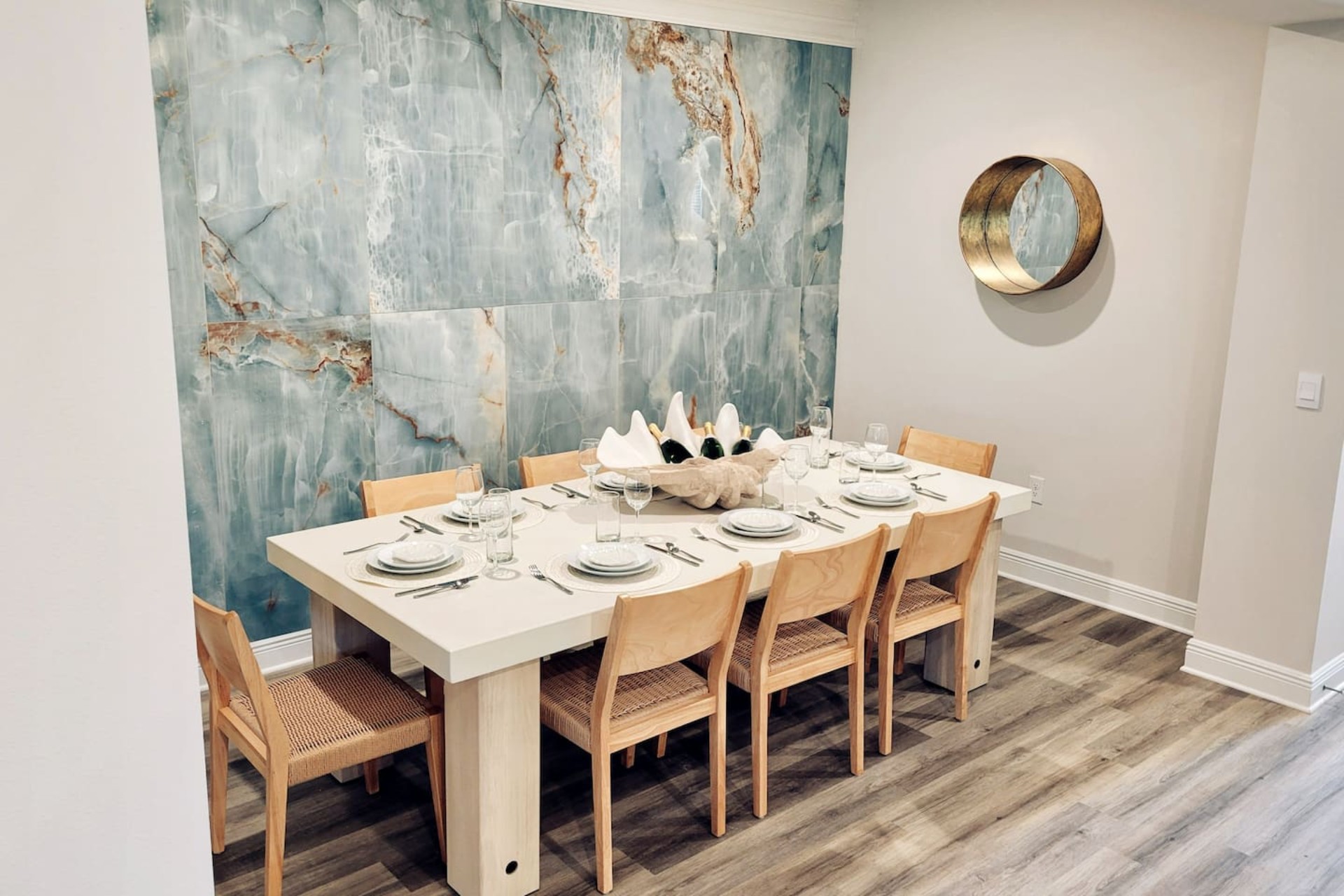 Dine in style at the table seating 8, plus island stools—fully equipped for family meals.