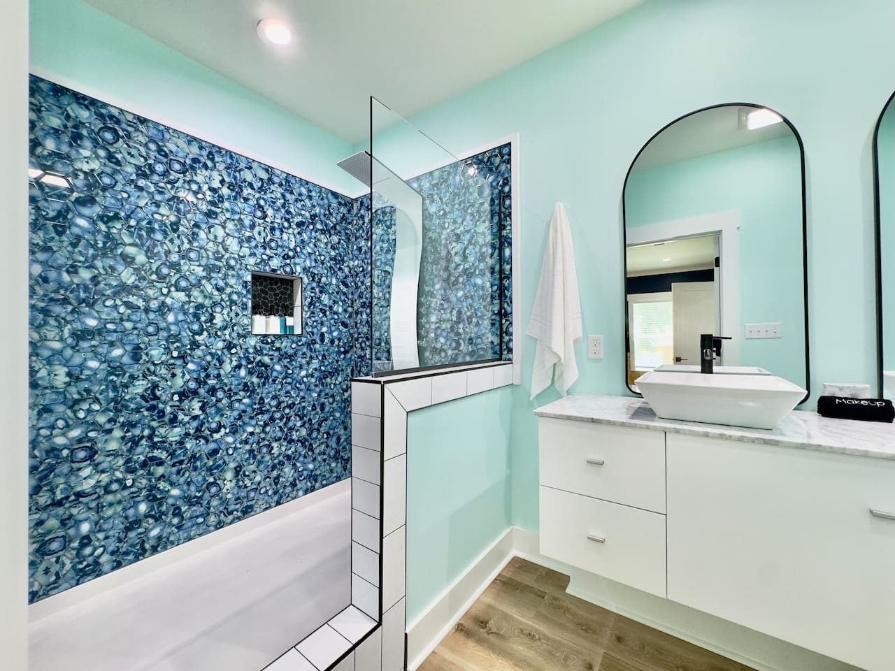Feel at home in this clean, spacious, and calming bath.
