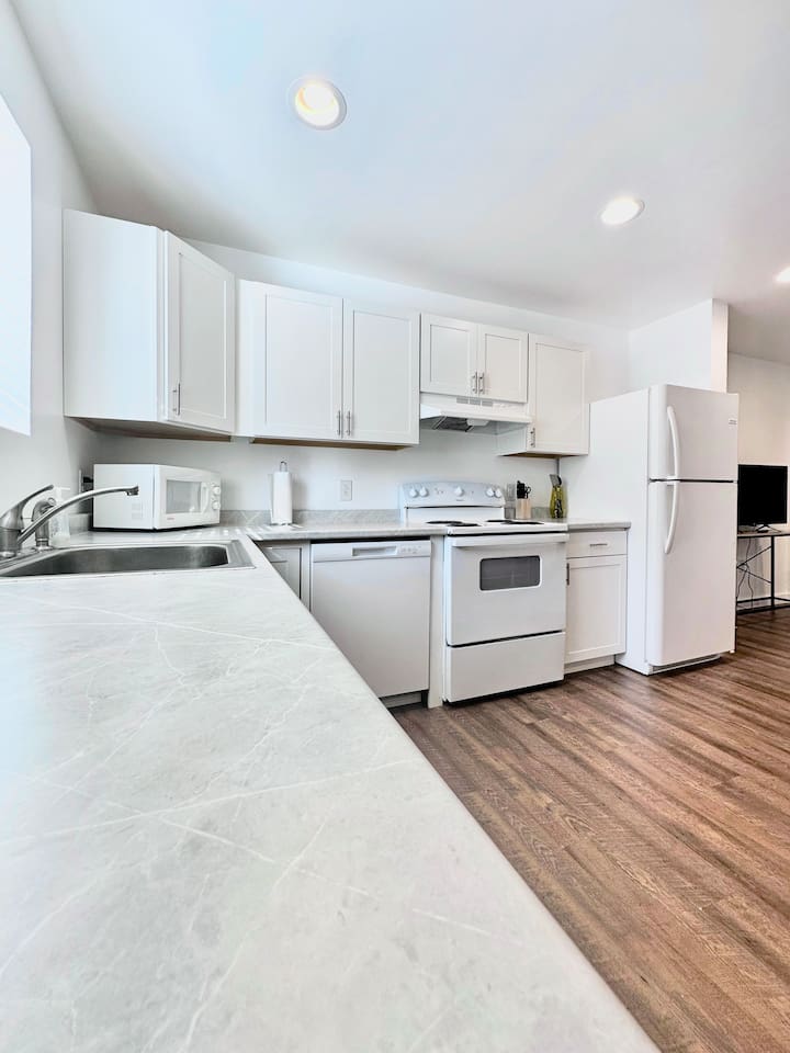 Brand new appliances and plenty of cabinet/prep space make this kitchen a home chef's dream!