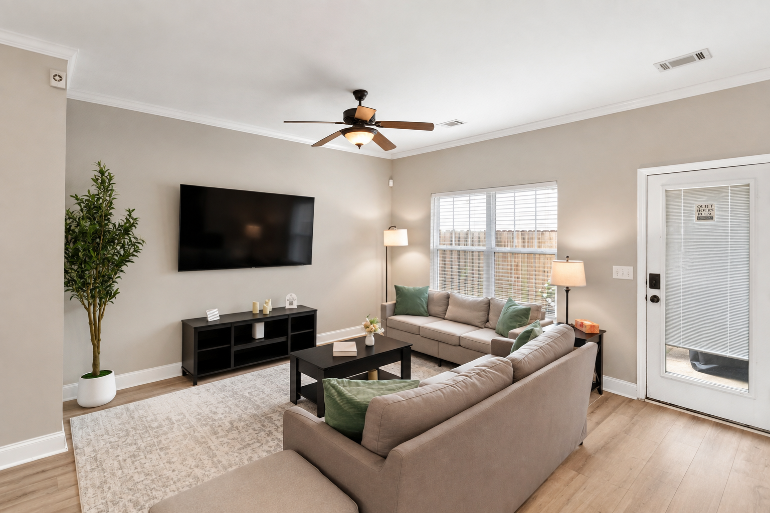 Living Room w/ Large Flat Screen Smart TV