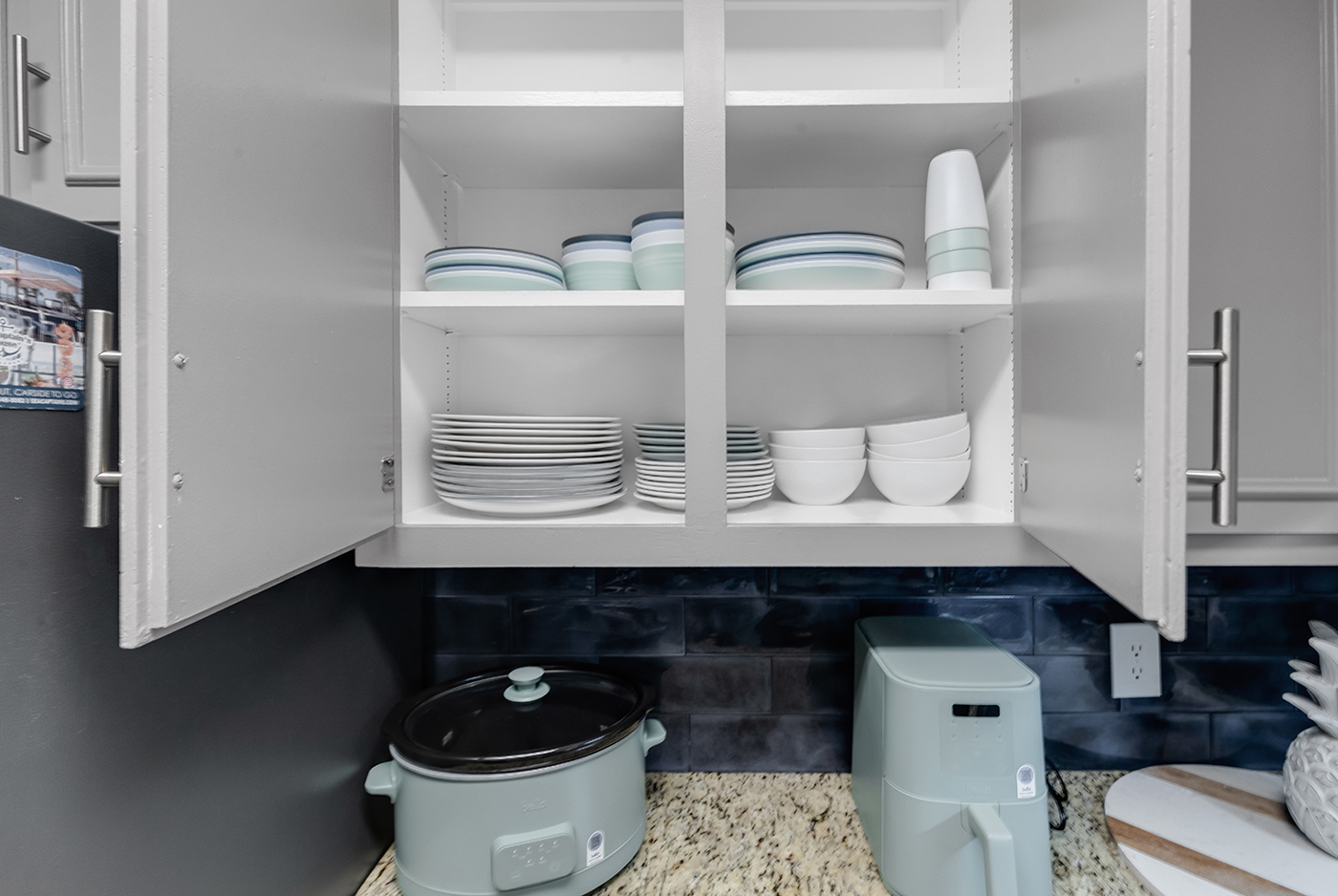 Kitchen Equipped with dishware 