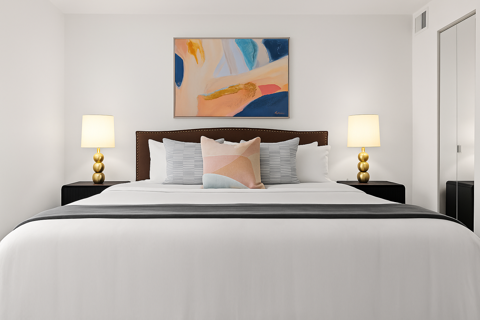 Rest easy in a plush king bed with stylish lighting, soft linens, and a relaxing atmosphere.