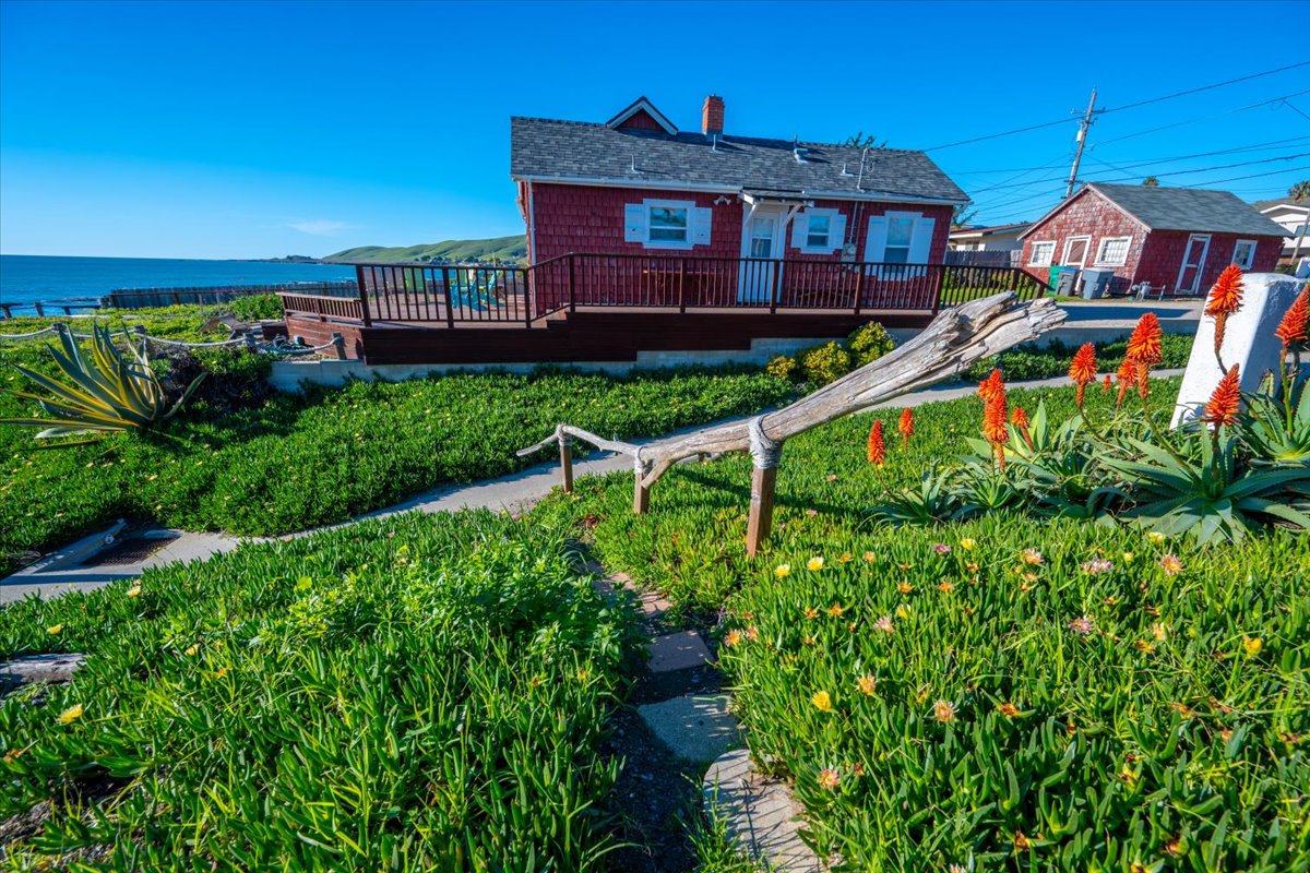 Private pathway connects to public beach access