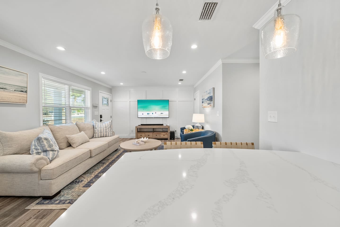 Living room of Unit B with a sleeper sofa. 