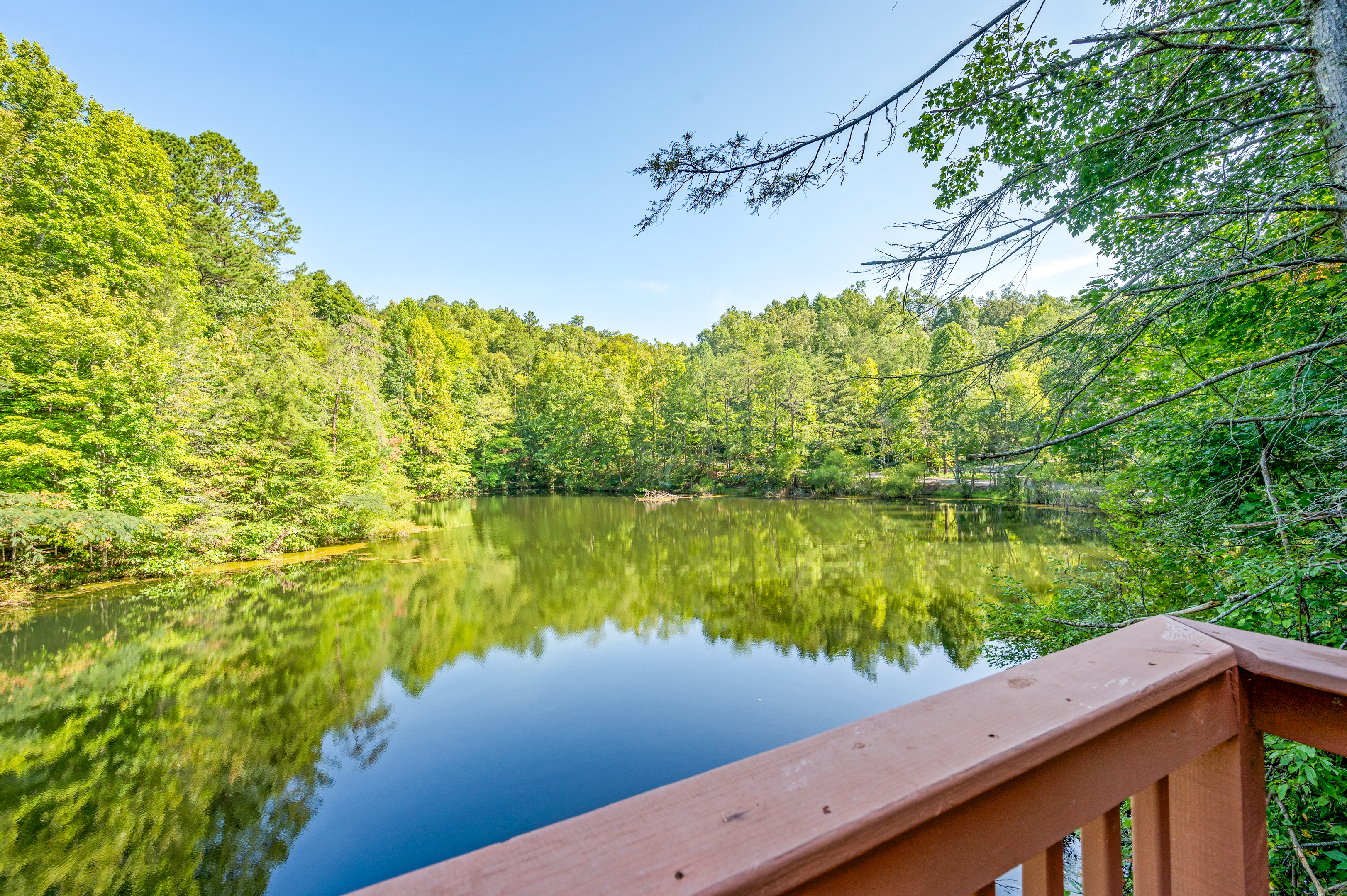 Relax At The Waters Edge As The Smokies Reflects Off The Water