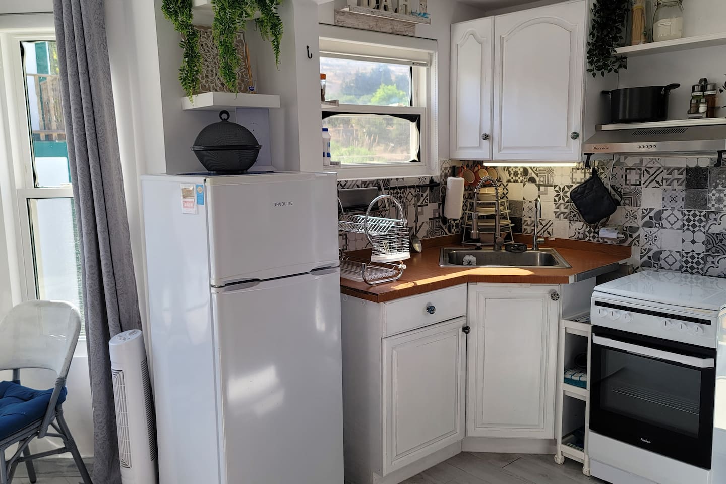 Stove top, oven,  microwave, refrigerator, toaster, fully equipped with dishes, pans, etc. 