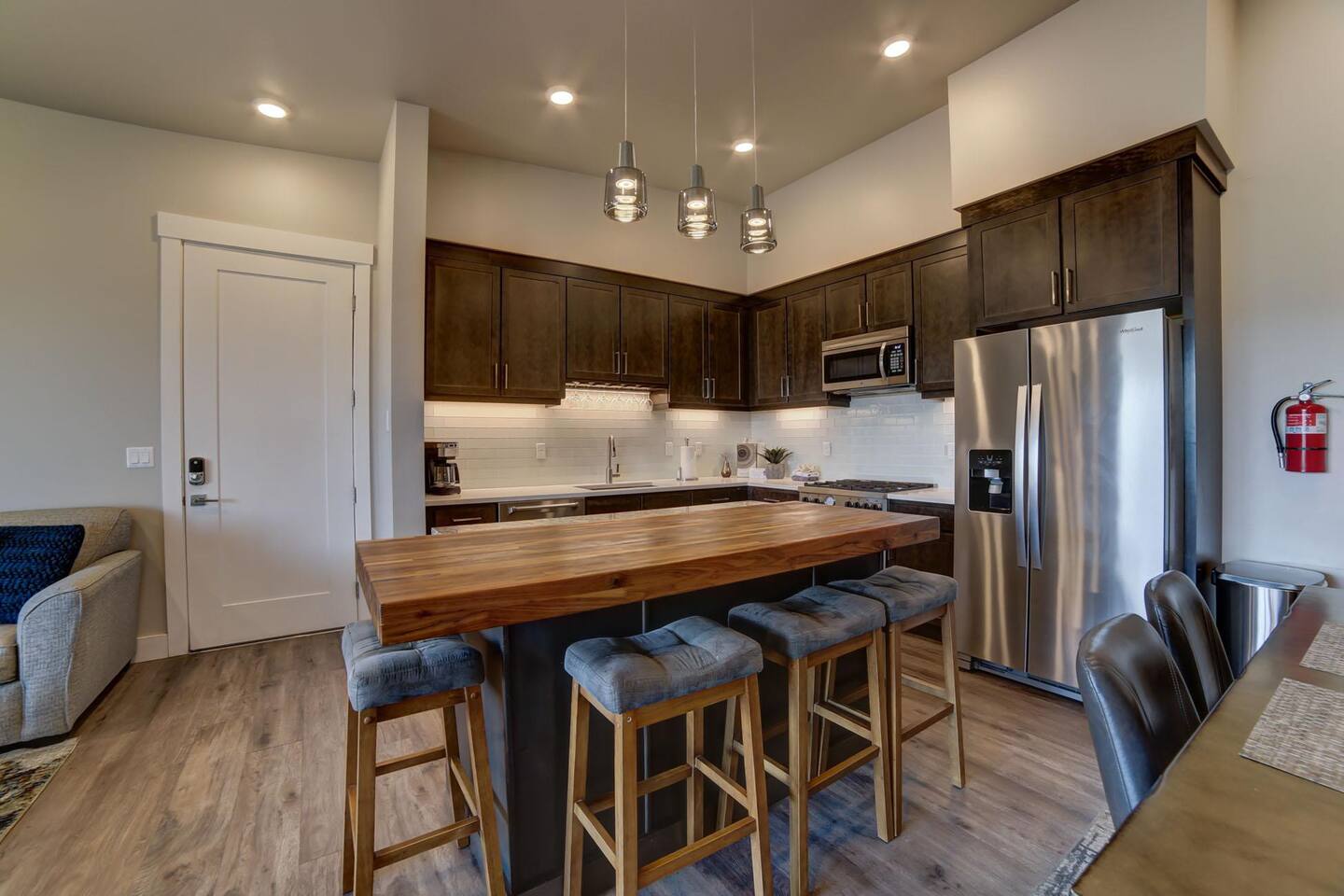 Modern luxurious kitchen with island bar and deluxe appliances