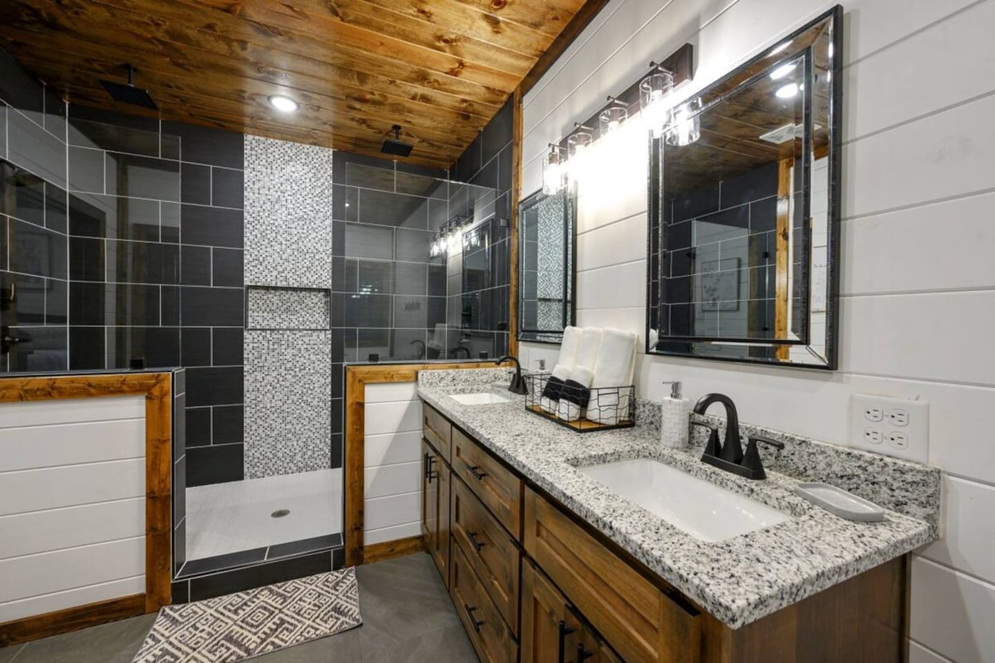Enjoy forest-inspired serenity even in the bath, with clean tile finishes and fresh linens.