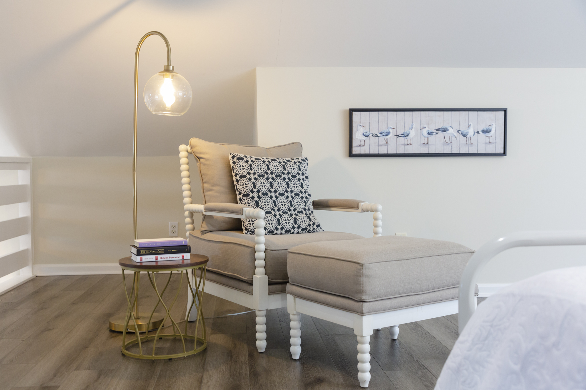Cozy chair and natural light create the perfect spot to unwind upstairs.