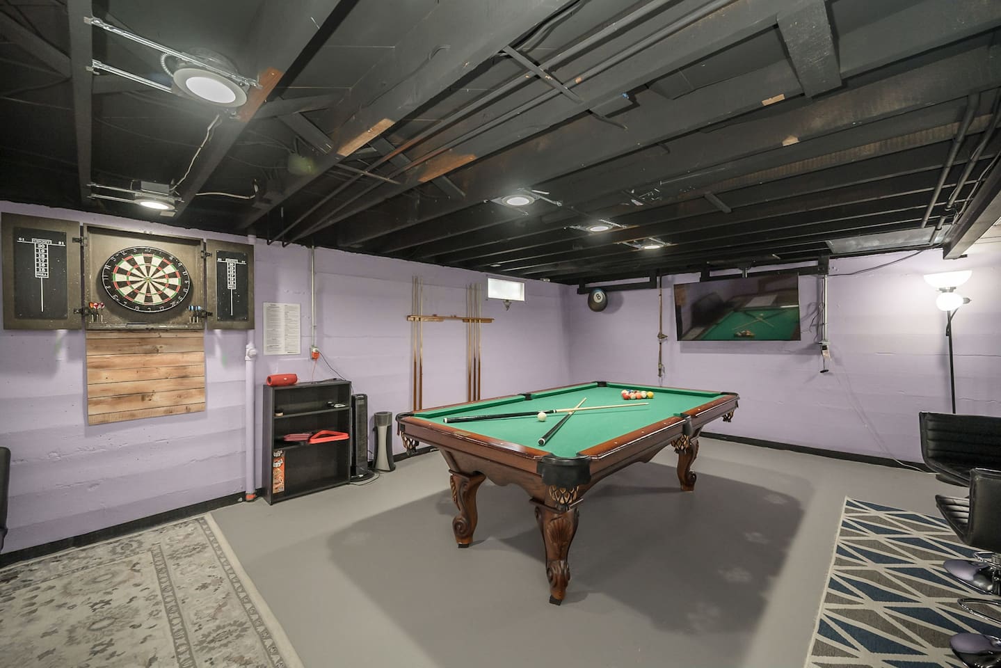Enjoy all the games in this semi-finished basement