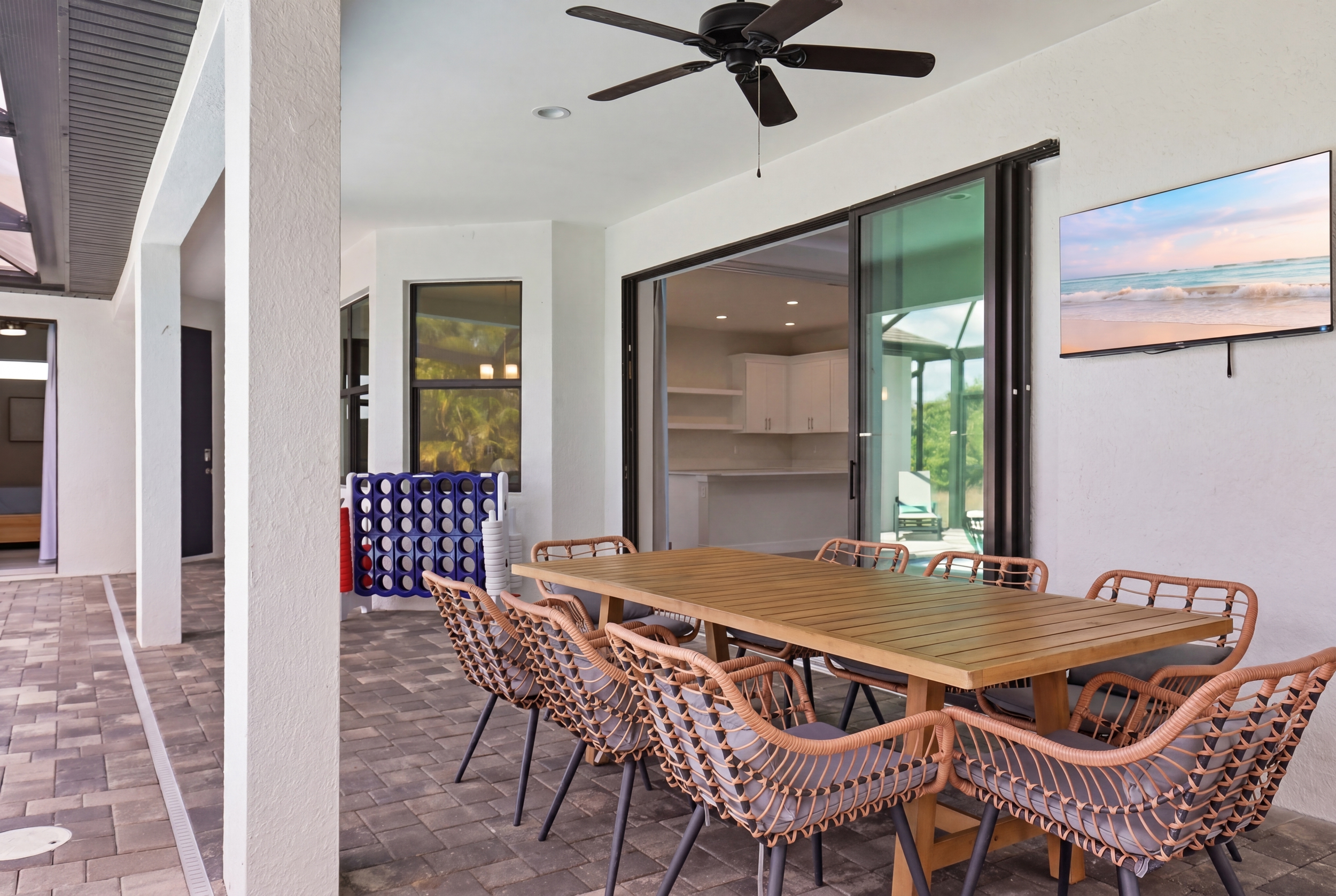 Main lanai with TV, grill and games.