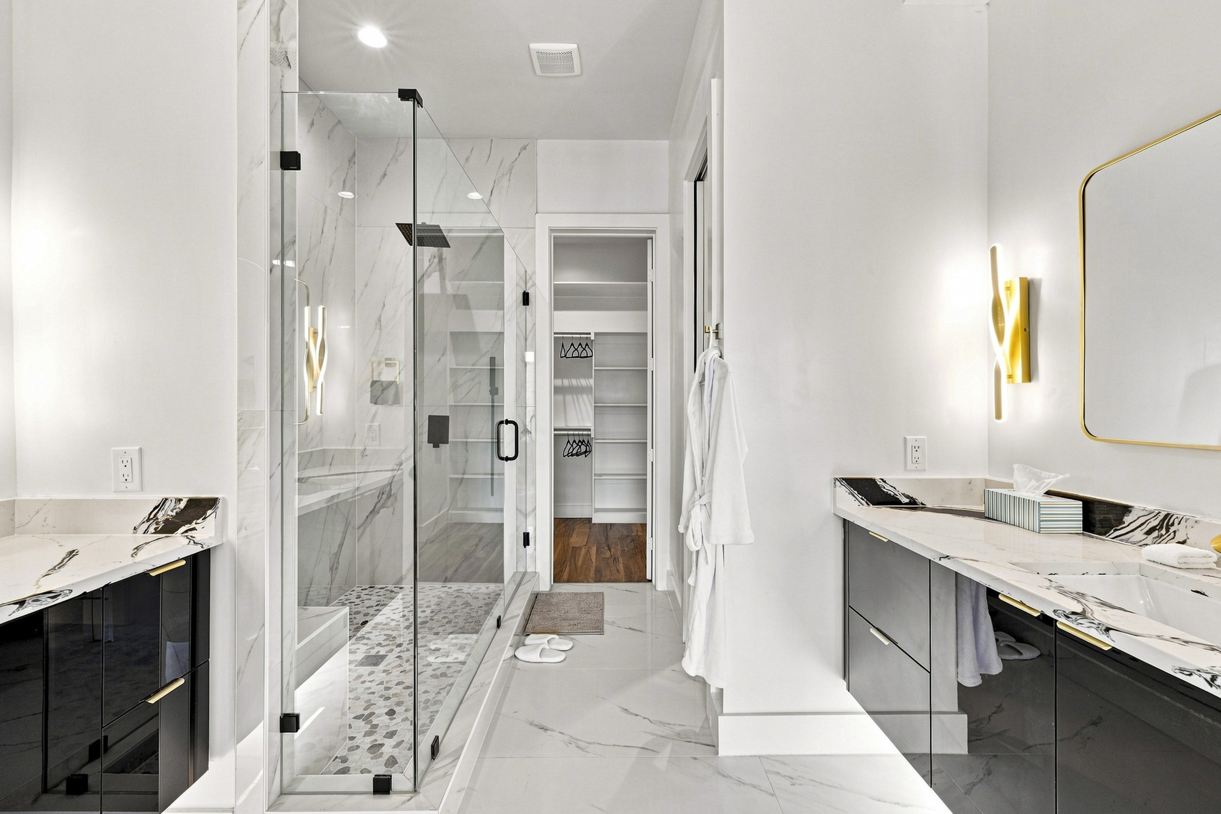 Indulge in a spa-like retreat with elegant finishes and modern fixtures!