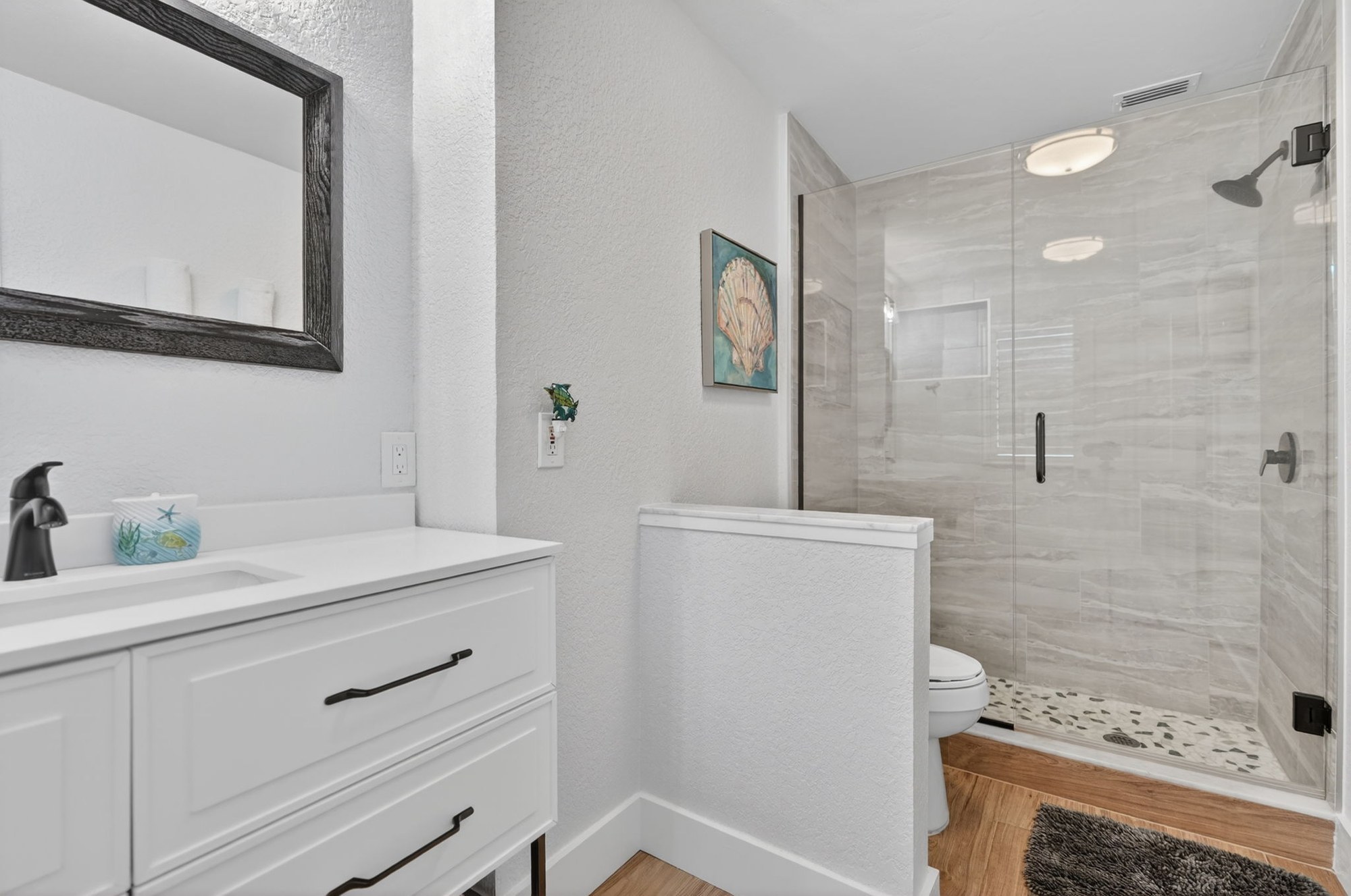 Bathroom with vanity and walk-in shower