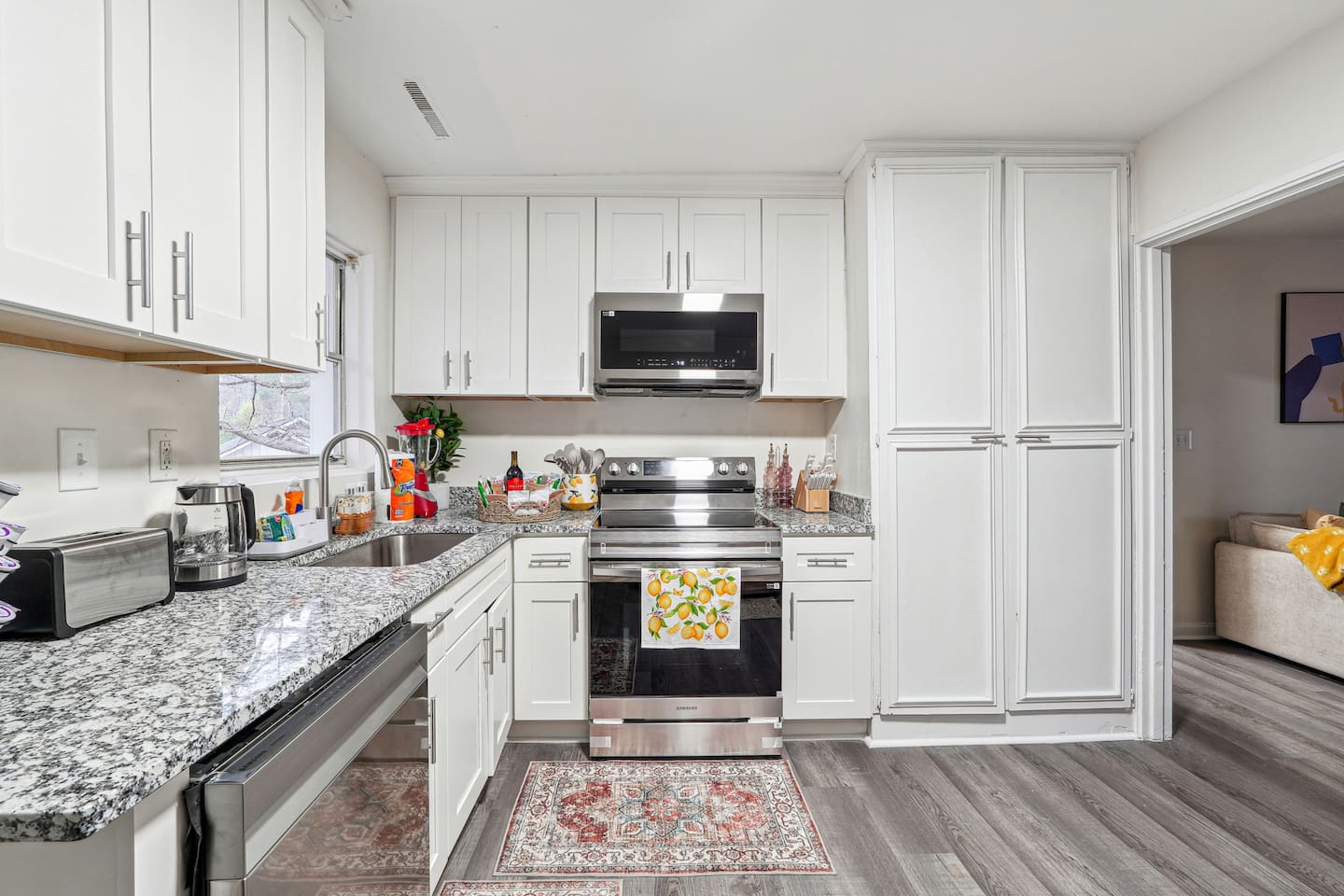 Enjoy a fully equipped kitchen featuring a dishwasher, oven, stove, microwave, sink, toaster, and coffee maker. It also comes stocked with glasses, cooking utensils, pots, pans, spoons, forks, and everything you need to prepare your favorite meals.
