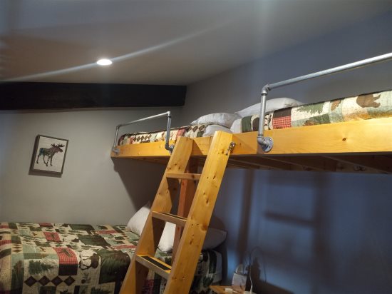 loft with full size bed and two twin beds
